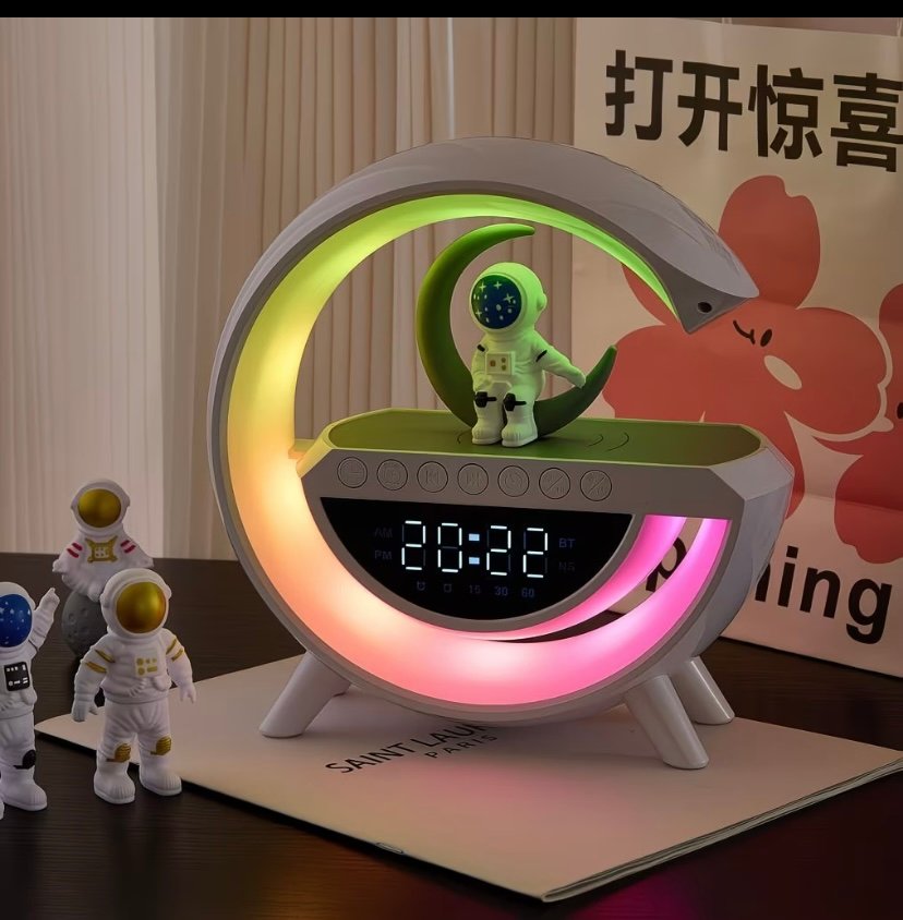 Wireless charging Bluetooth speaker with volume control
